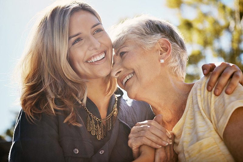 Shot of a happy senior woman spending quality time with her daughter outdoors